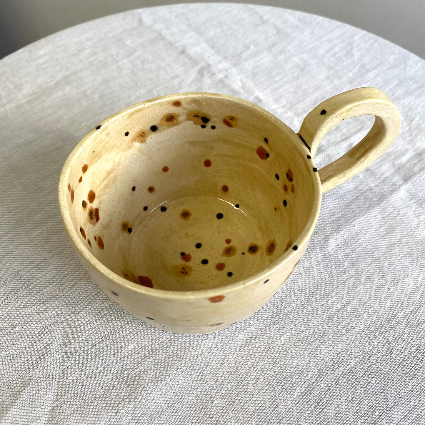 Angel in Terracotta and Spotted Cream - Large Coffee Cup